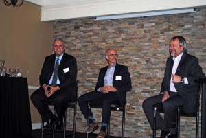 Rob Voisin of Habitat For Humanity Canada (left), Paul Klein of Impakt Corp. (centre) and Norm Sneyd of Bison Transport (right) discuss the many benefits to corporate charitable giving.